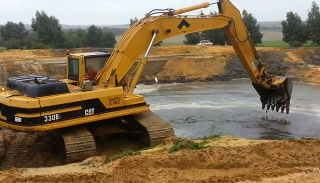 Рытье водоемов в Большом Камне - цена от 938 руб. | 2Землекопа-Бль